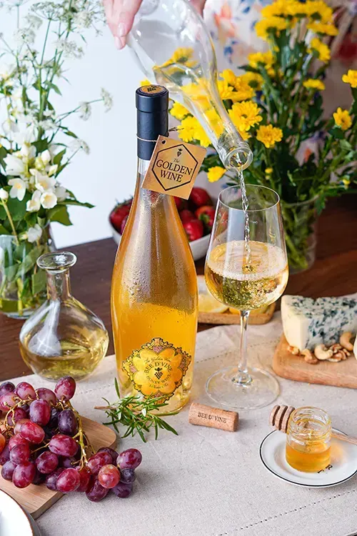 Bee d'Vine 3L Double Magnum Honey Wine served at the table